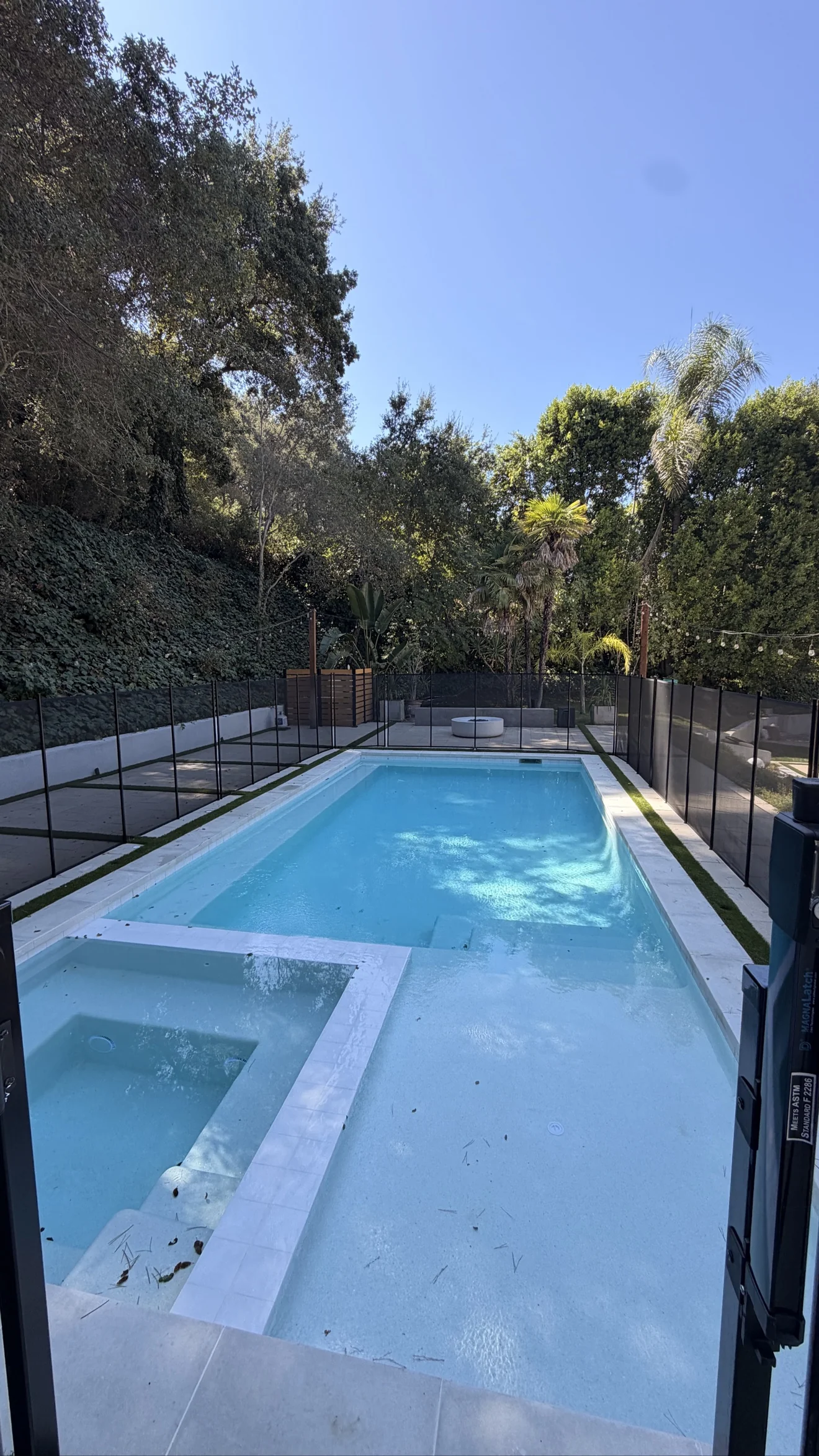 Patio grid with turf and pavers by Moda Outdoor Living in Encino, CA — luxury outdoor living design and build
