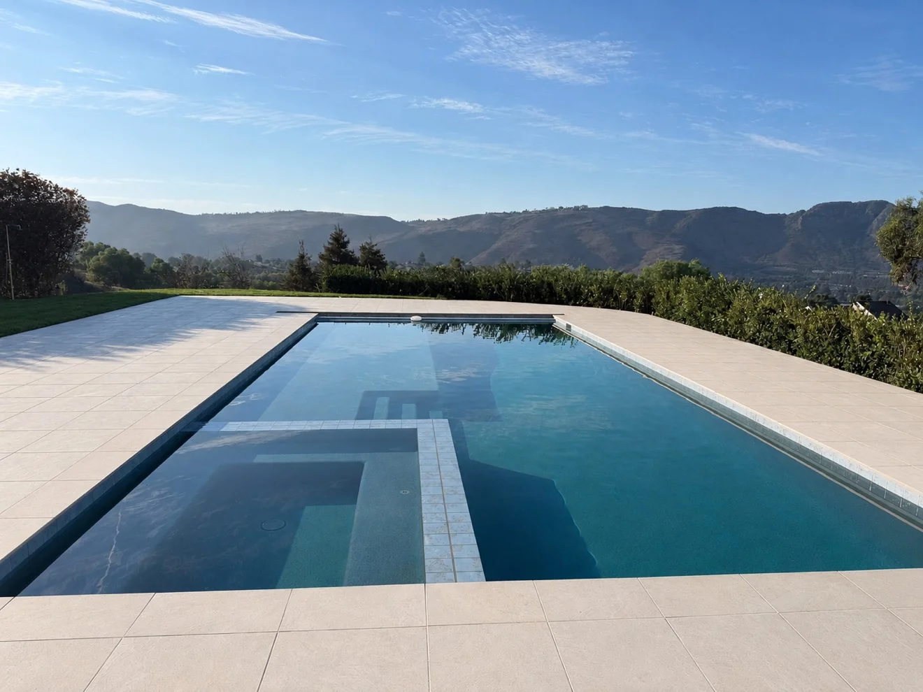 Pool terrace facing the mountains by Moda Outdoor Living in Santa Rosa Valley, CA — luxury outdoor living design and build