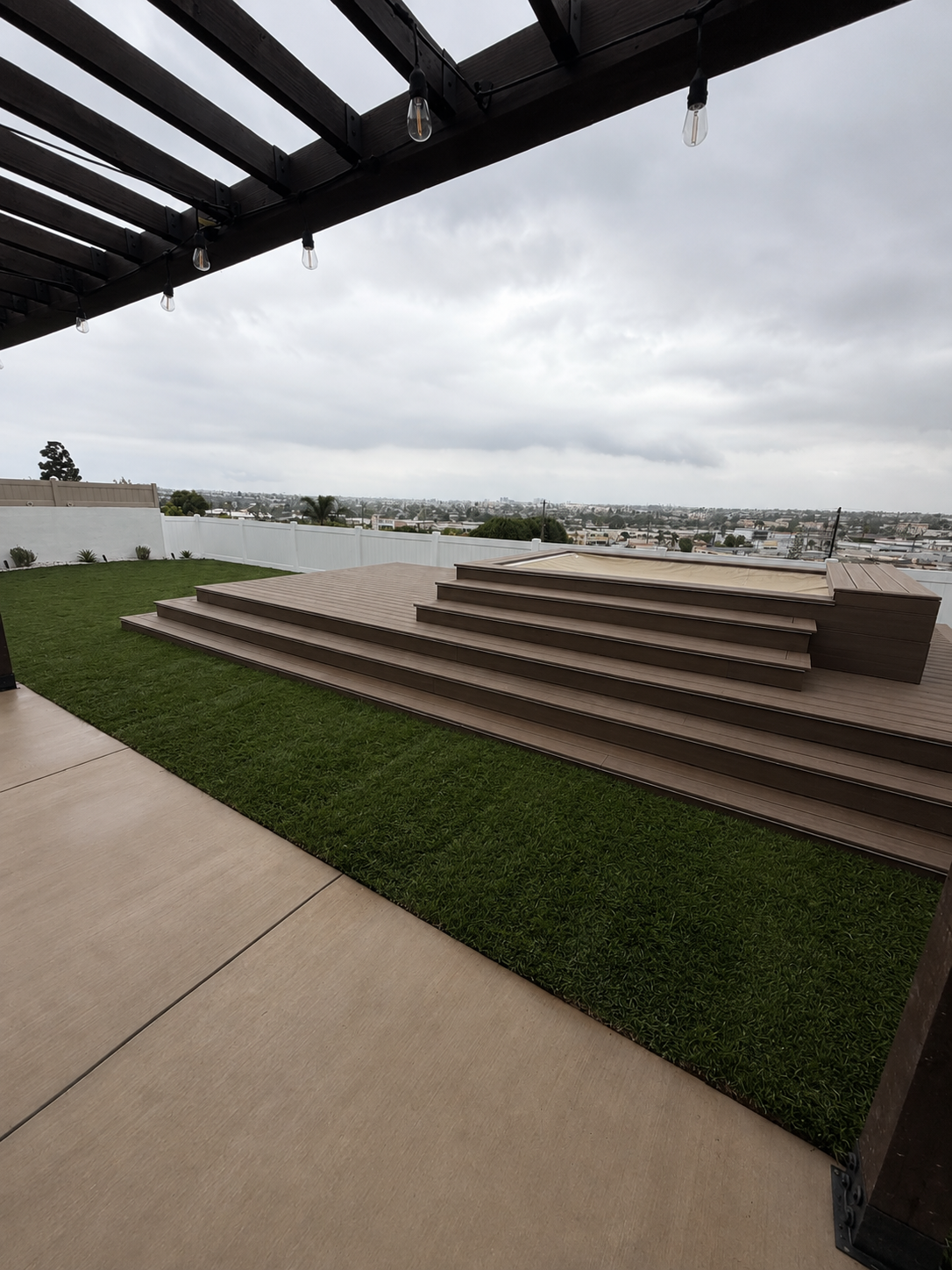 Tiered deck with integrated lighting and spa in Palos Verdes
