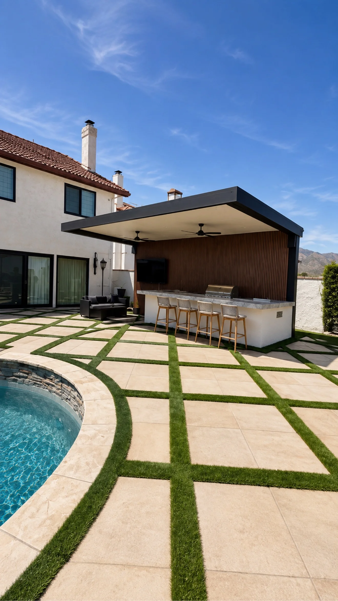 Pergola bar with TV and grill by Moda Outdoor Living in Porter Ranch, CA — luxury outdoor living design and build