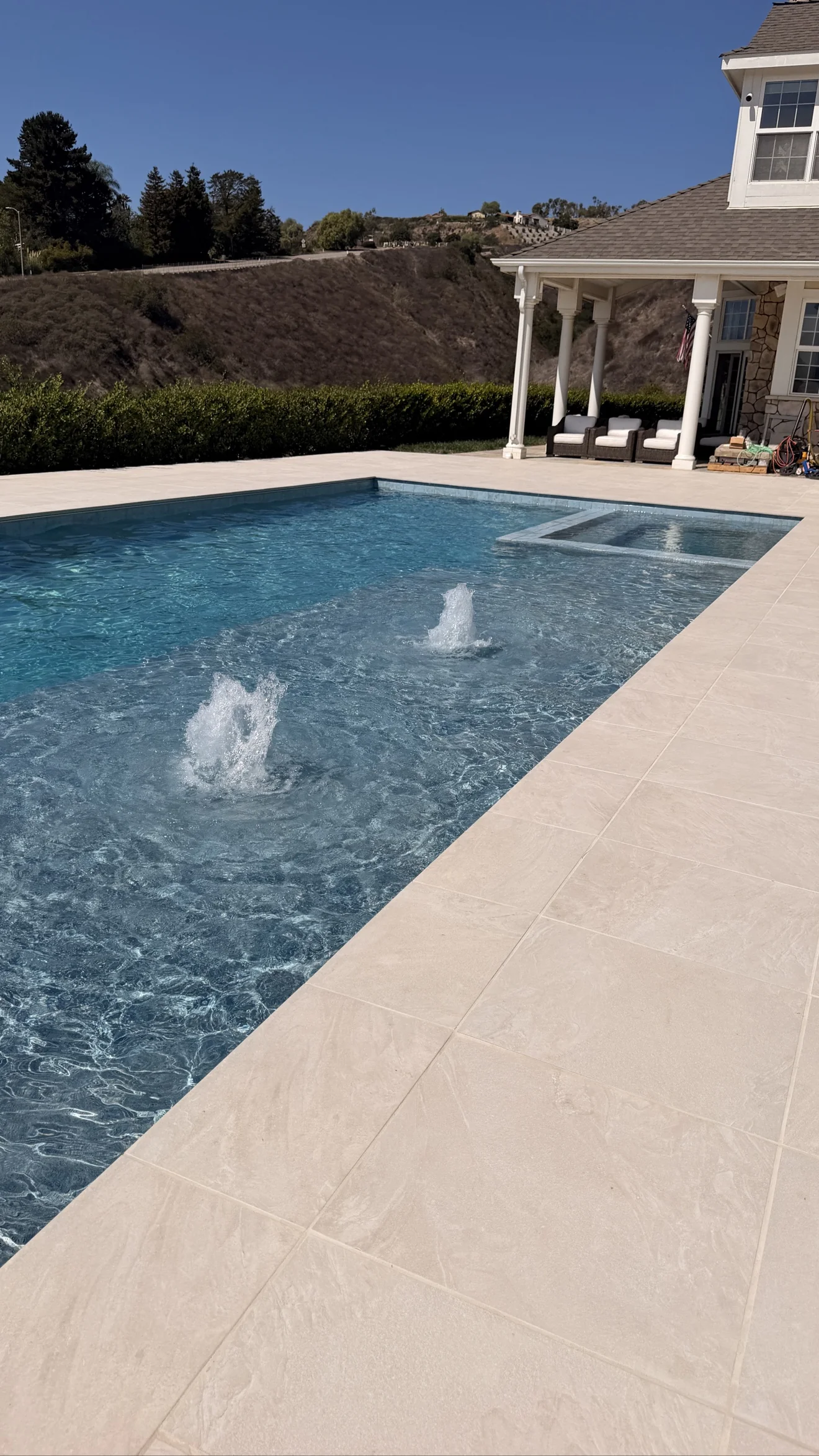 Estate pool with deck jets by Moda Outdoor Living in Santa Rosa Valley, CA — luxury outdoor living design and build