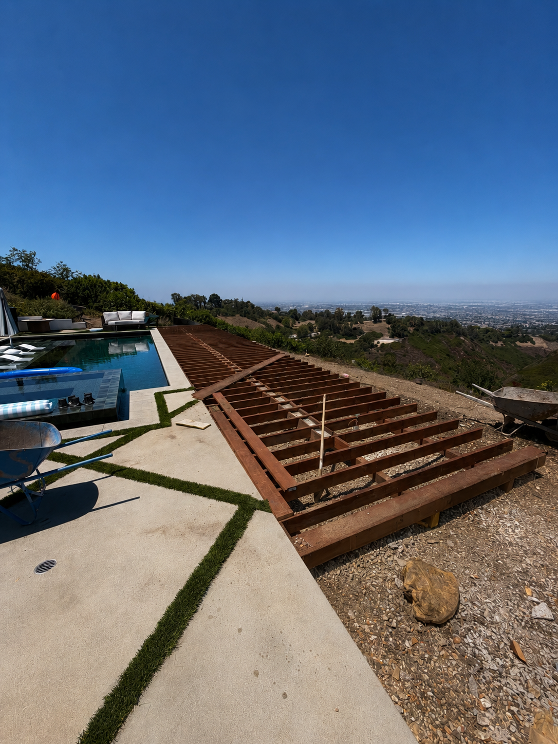 Deck Framing in Progress on Hillside Pool Terrace by Moda Outdoor Living in Rolling Hills, CA — luxury outdoor living design and build