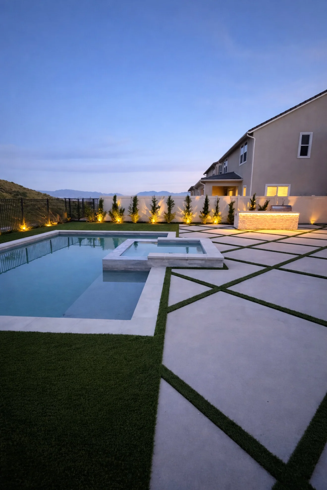 Covered patio with fireplace by Moda Outdoor Living in Santa Clarita, CA — luxury outdoor living design and build