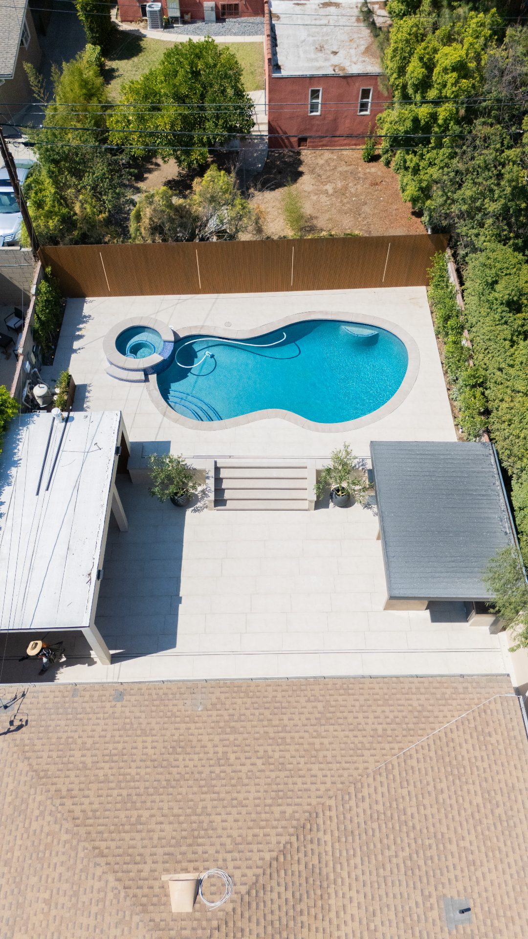 Aerial view of pool and deck construction