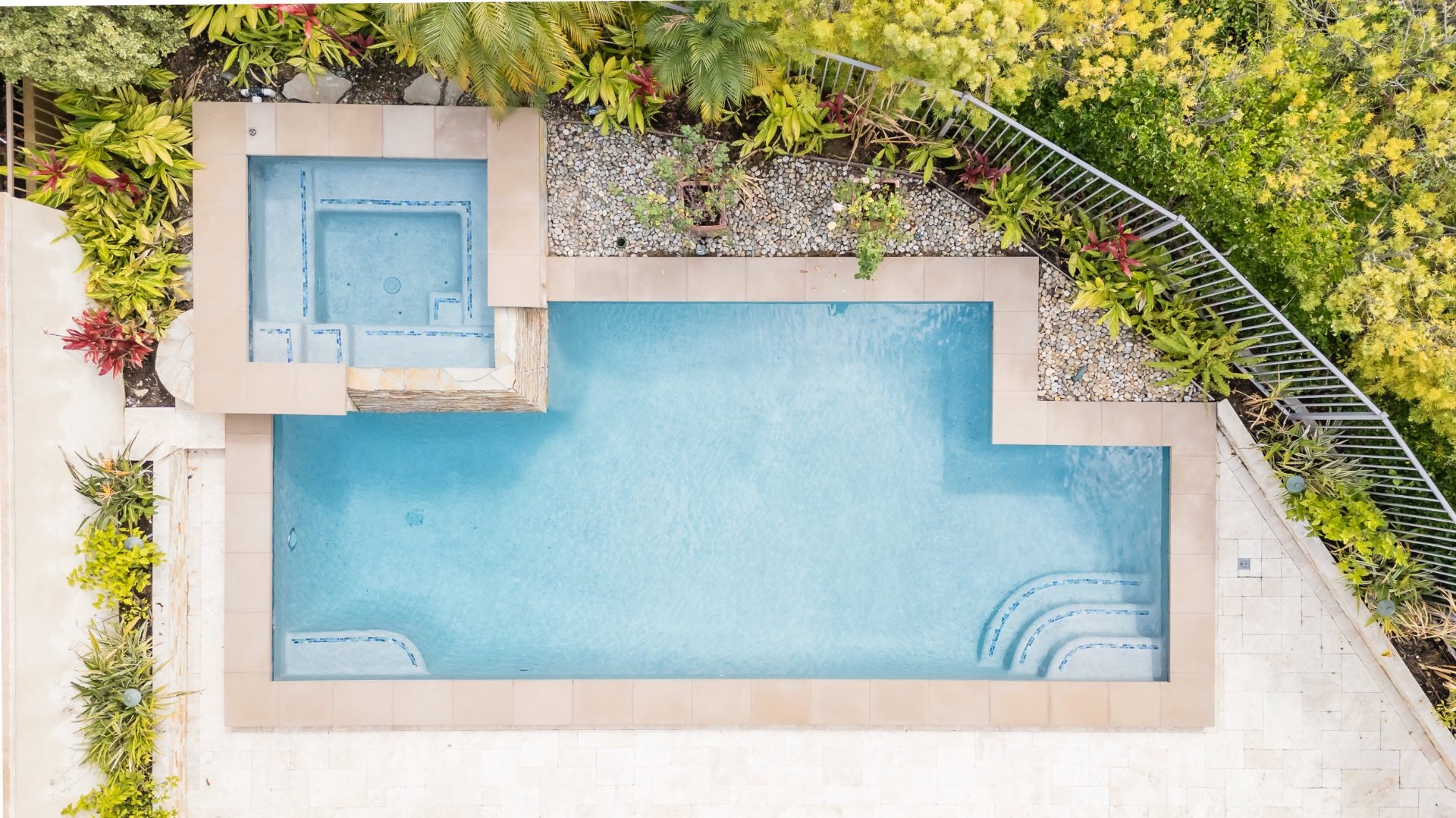 Aerial view of pool with raised spa