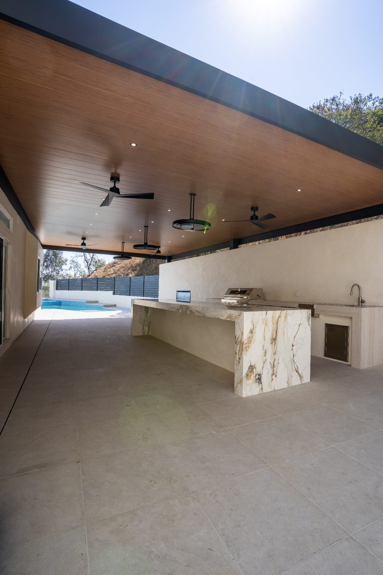 Phased backyard remodel with pool and landscape - Moda Outdoor Living Los Angeles