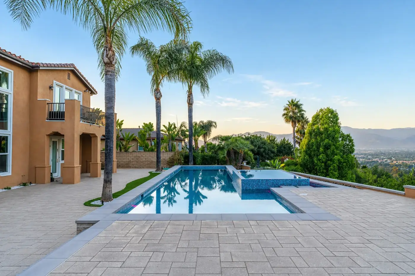 Pool & Spa with Paver Deck and Hilltop Vista — luxury outdoor living design and build by Moda Outdoor Living