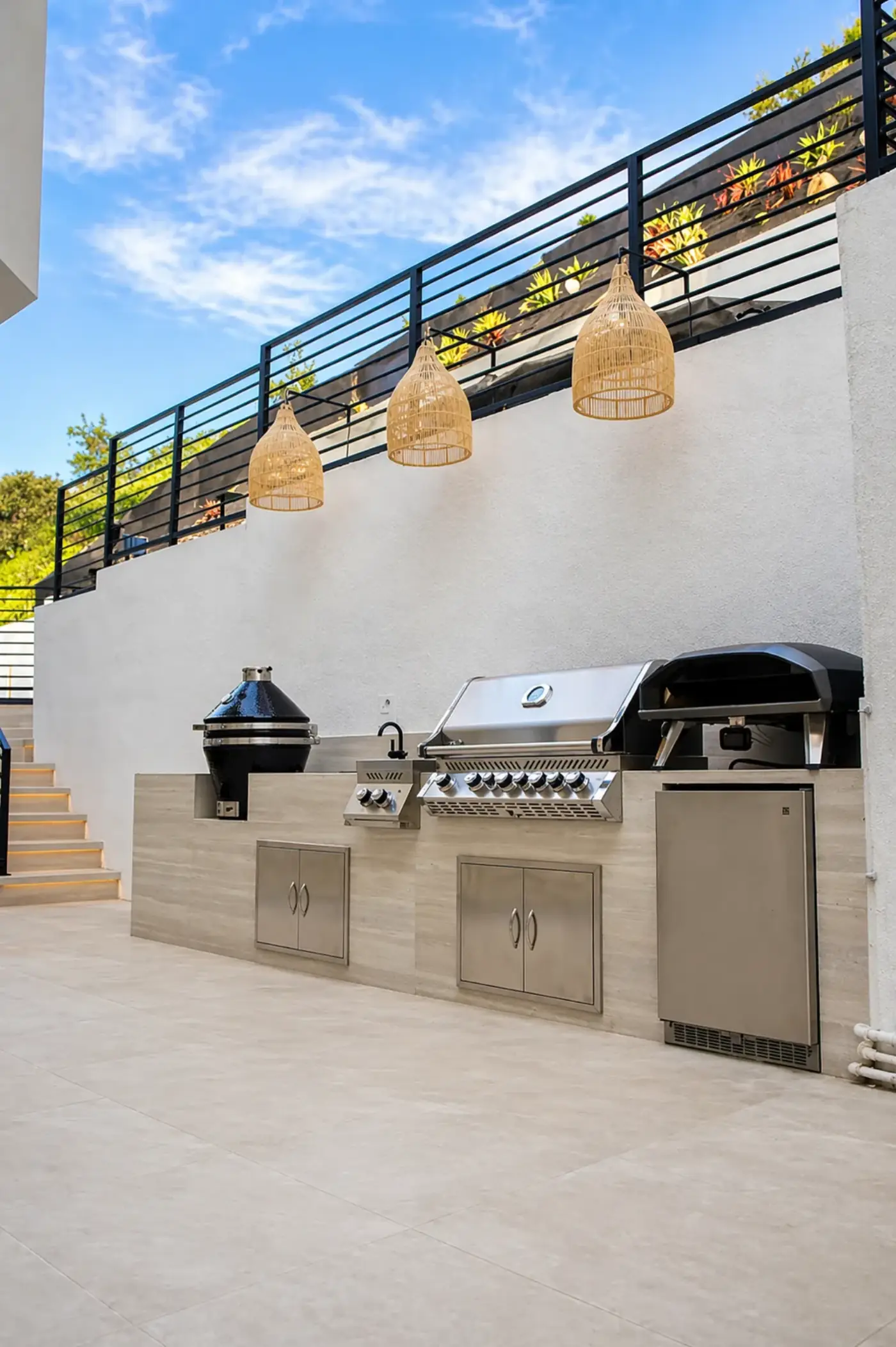 Modern Outdoor Kitchen with Pendant Lighting — luxury outdoor living design and build by Moda Outdoor Living