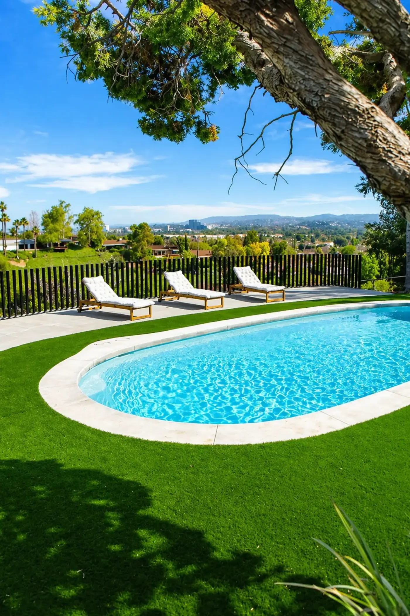 Pool with Turf Lawn & Panoramic City View — luxury outdoor living design and build by Moda Outdoor Living