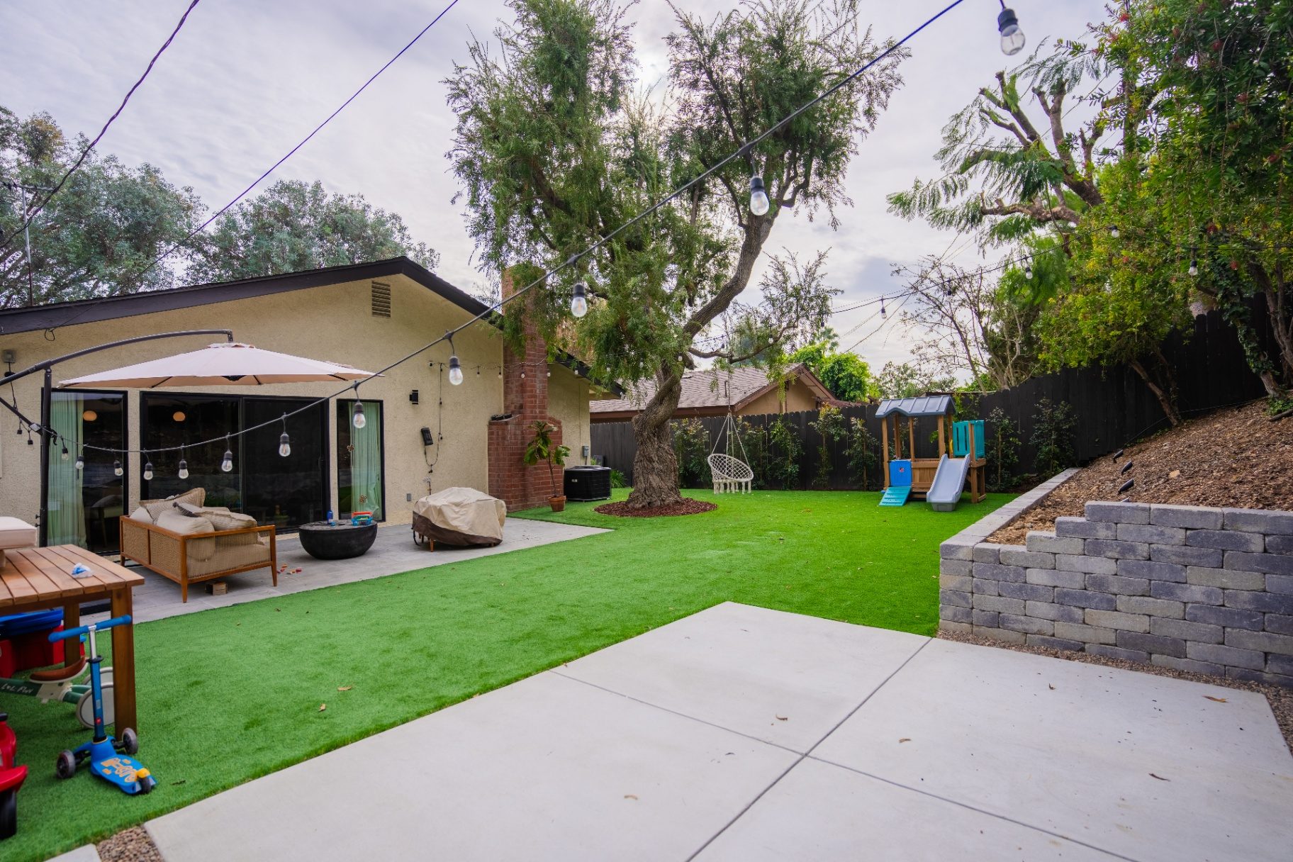 Backyard with ADU-compatible layout and turf - Moda Outdoor Living Los Angeles