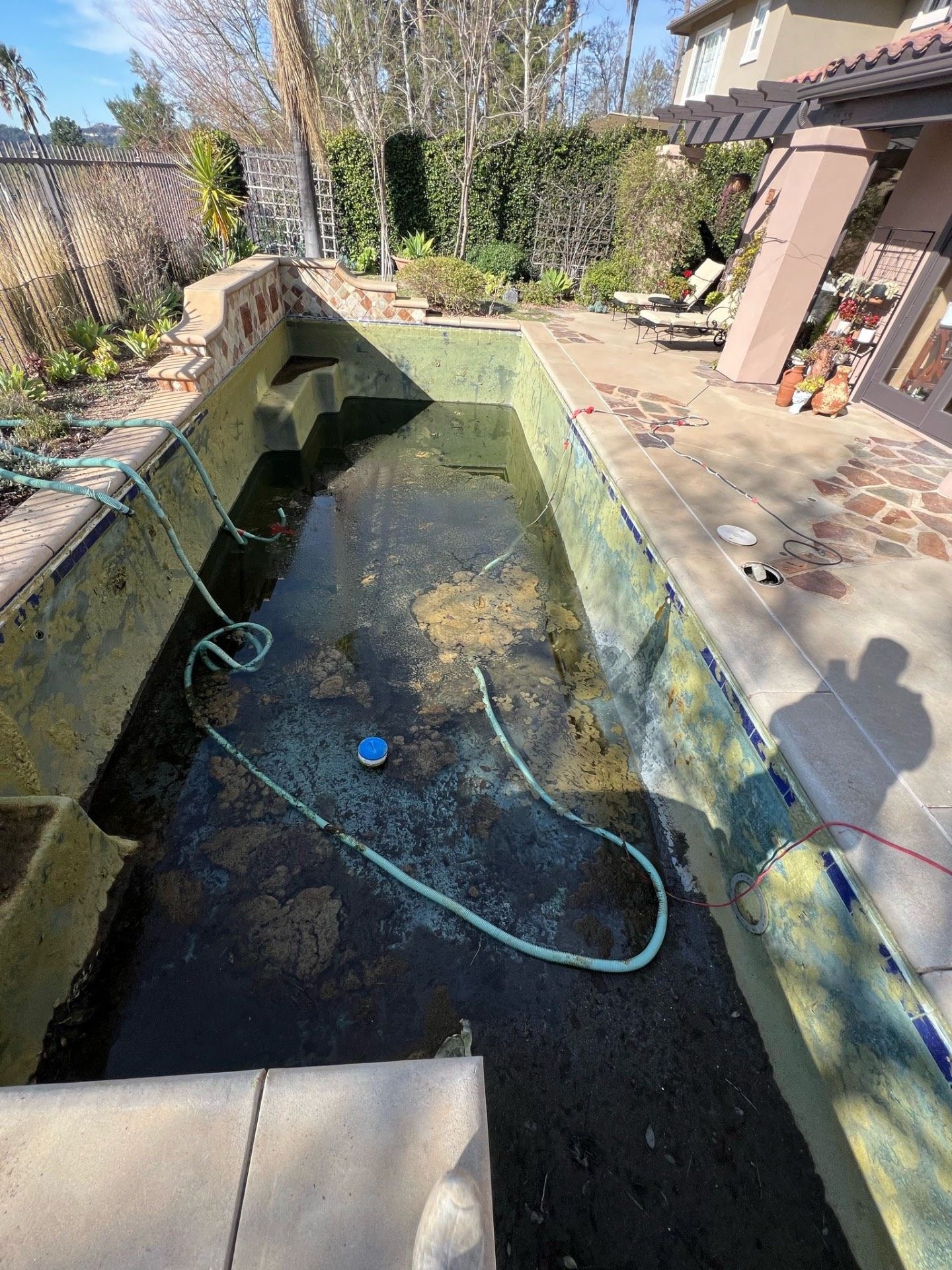 Pool with new water features after fire restoration