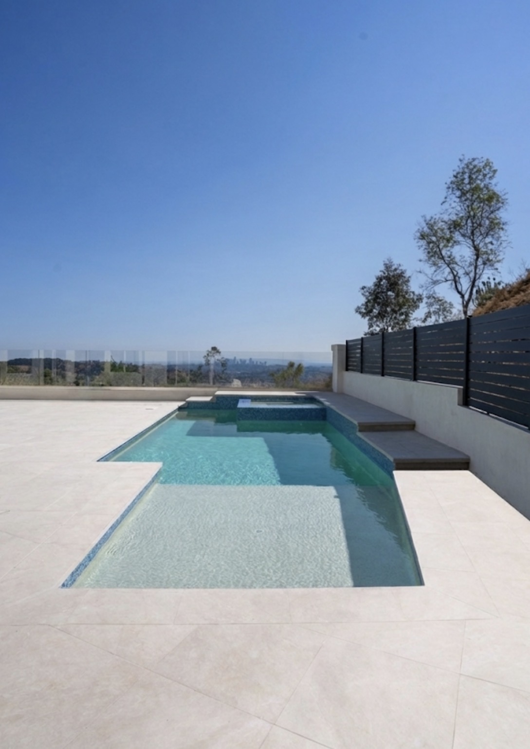 Geometric pool and spa showcasing integrated design-build approach