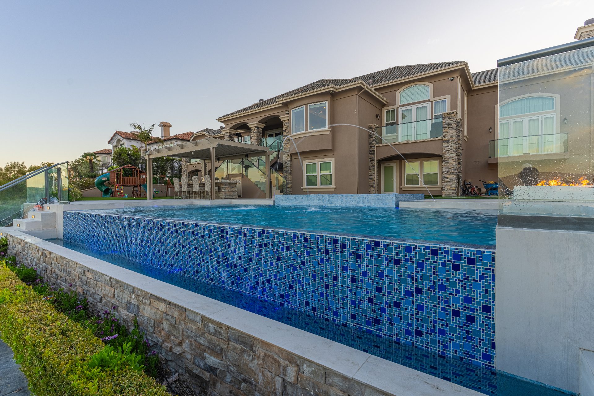 Close-up of infinity pool spa with tile detail
