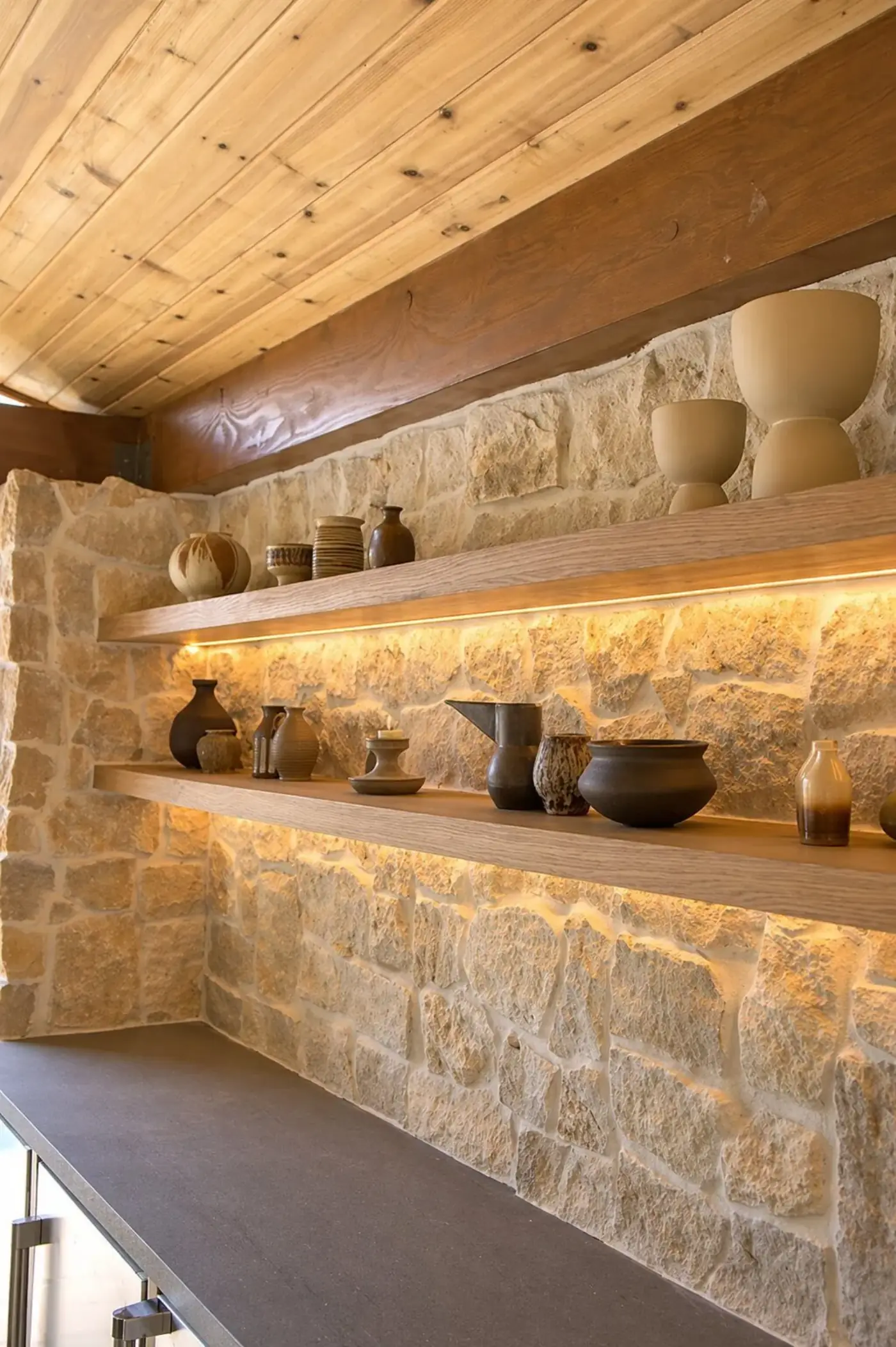 Stone Accent Wall with Shelving by Moda Outdoor Living in Silver Lake, CA — luxury outdoor living design and build