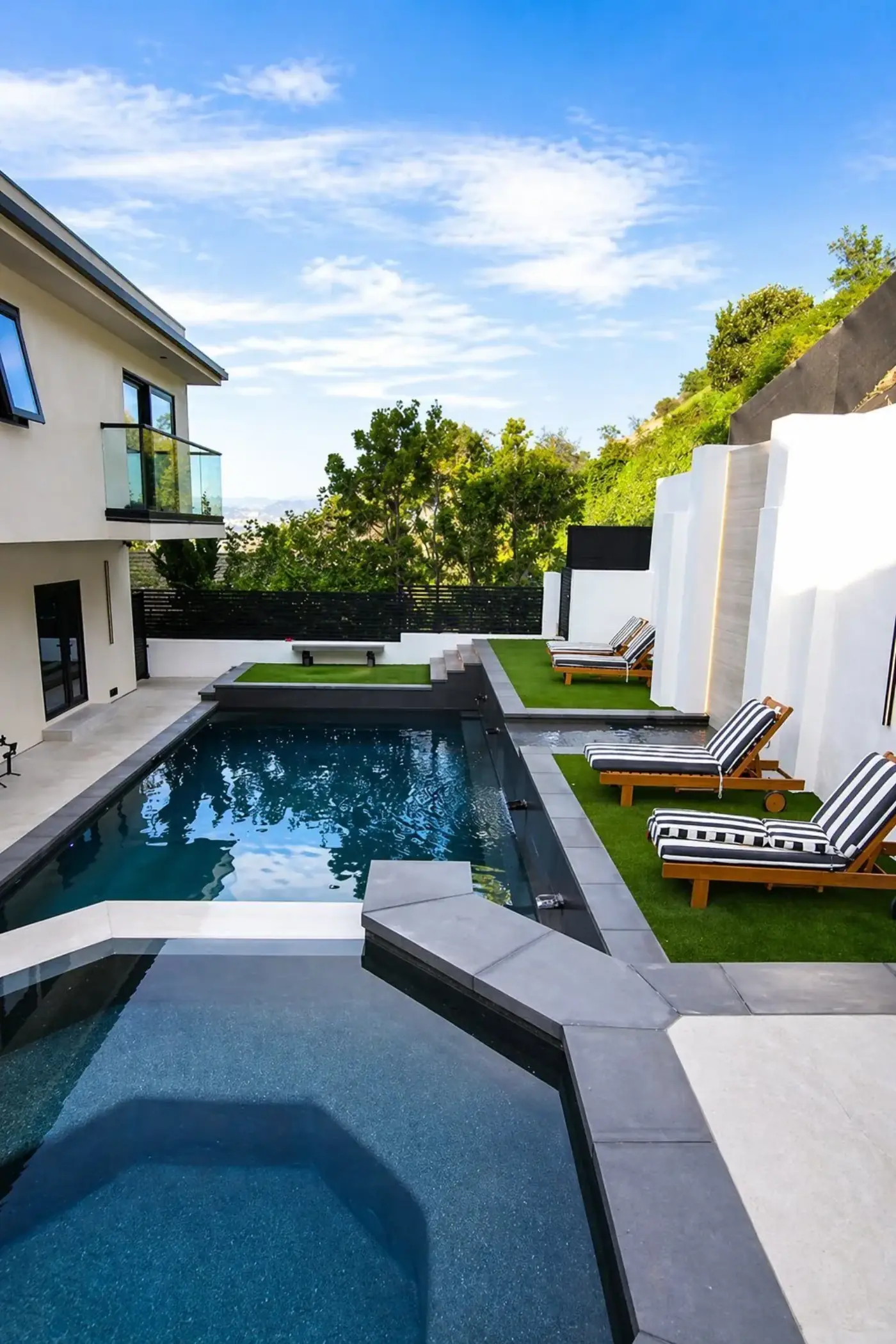 Modern Pool, Spa & Lounge Area by Moda Outdoor Living in Baldwin Hills, CA — luxury outdoor living design and build