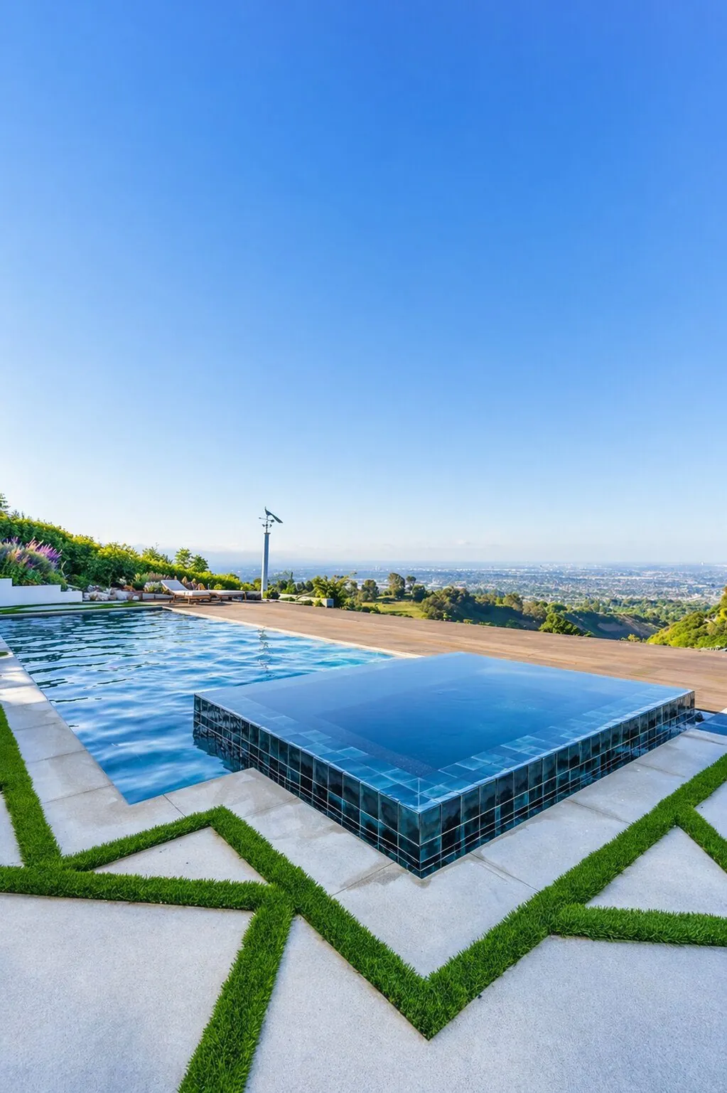Hillside Pool with Raised Spa by Moda Outdoor Living in Rolling Hills, CA — luxury outdoor living design and build