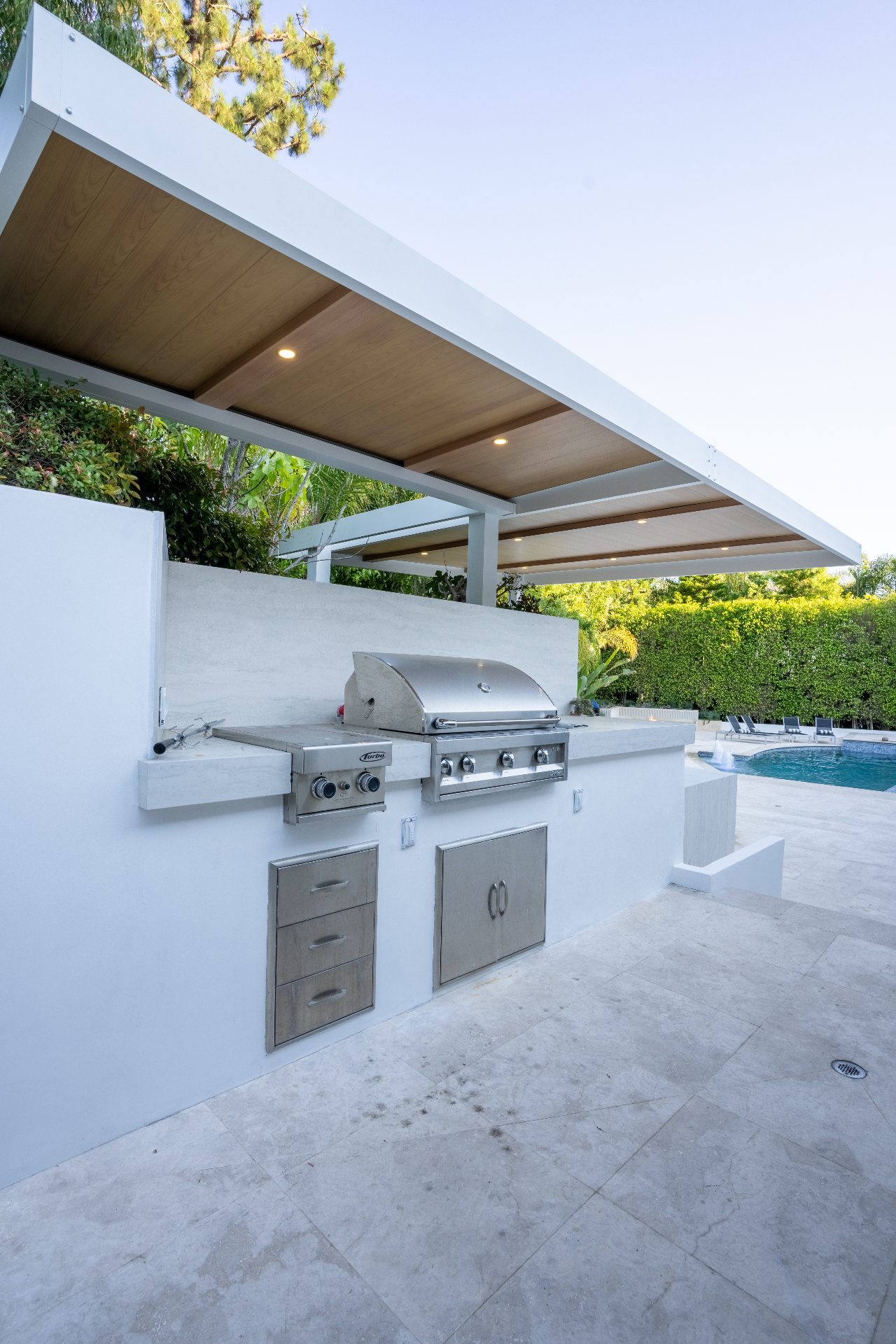 Modern pool deck with mountain views in Los Angeles showcasing 2026-compliant design