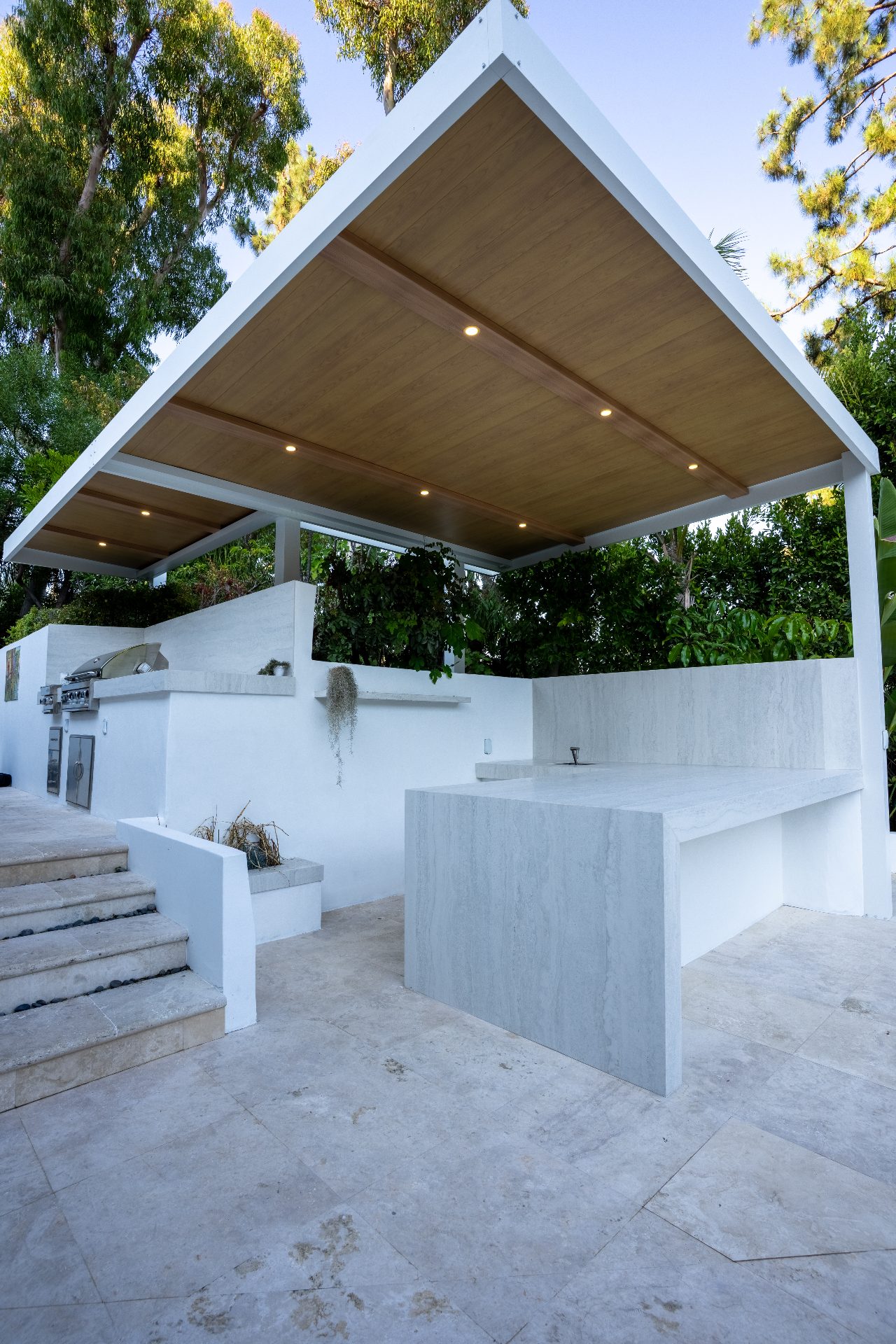 Pool and spa with travertine deck and fire pit