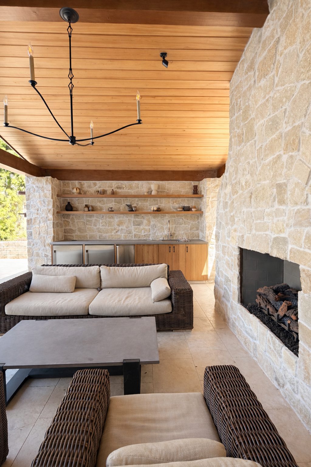 3D render of outdoor stone fireplace and pizza oven kitchen design