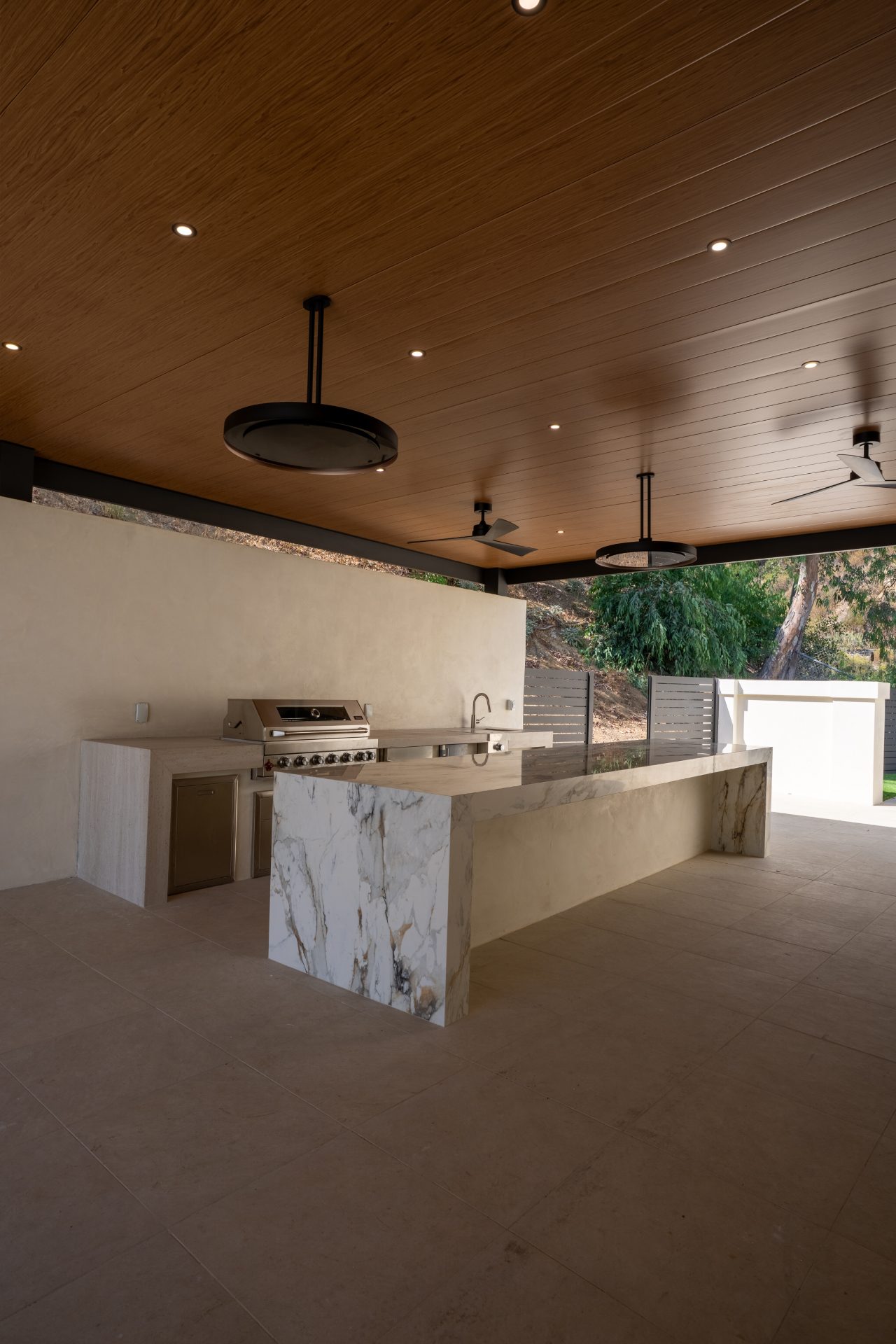 Complete luxury backyard package with pool, pergola, outdoor kitchen, and landscaping in Los Angeles