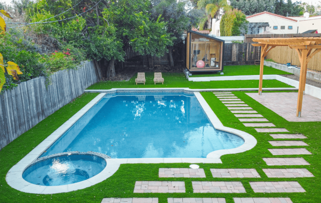 Classic brick paver patio in a herringbone pattern, adding warmth and charm to a traditional outdoor space