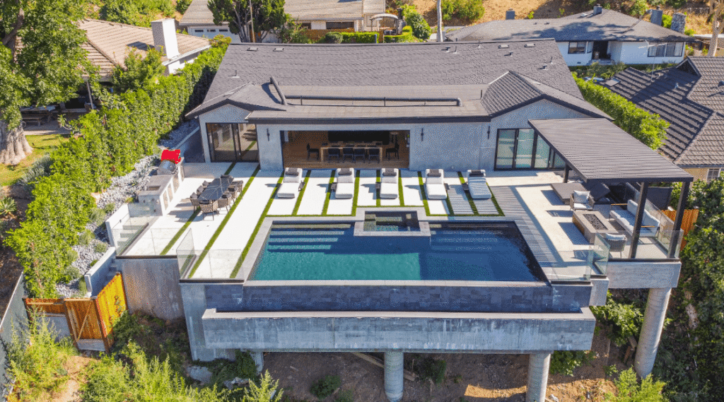 Sleek porcelain paver patio with clean lines and neutral tones, ideal for a modern low-maintenance outdoor space